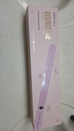 Roating curling iron