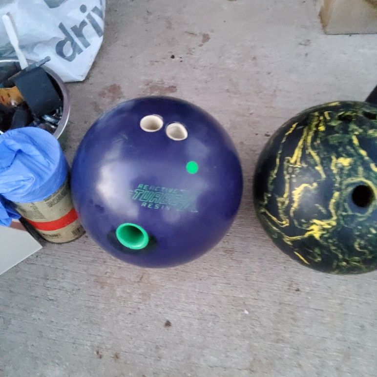 2 BOWLING BALLS  SEE PICTURES 