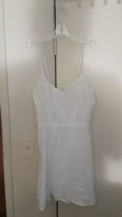 white dress size M has a slip attached very nice new without tags