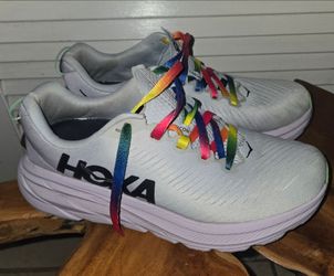 Hoka Rincon 3 running sneakers with rainbow laces US 10B women
