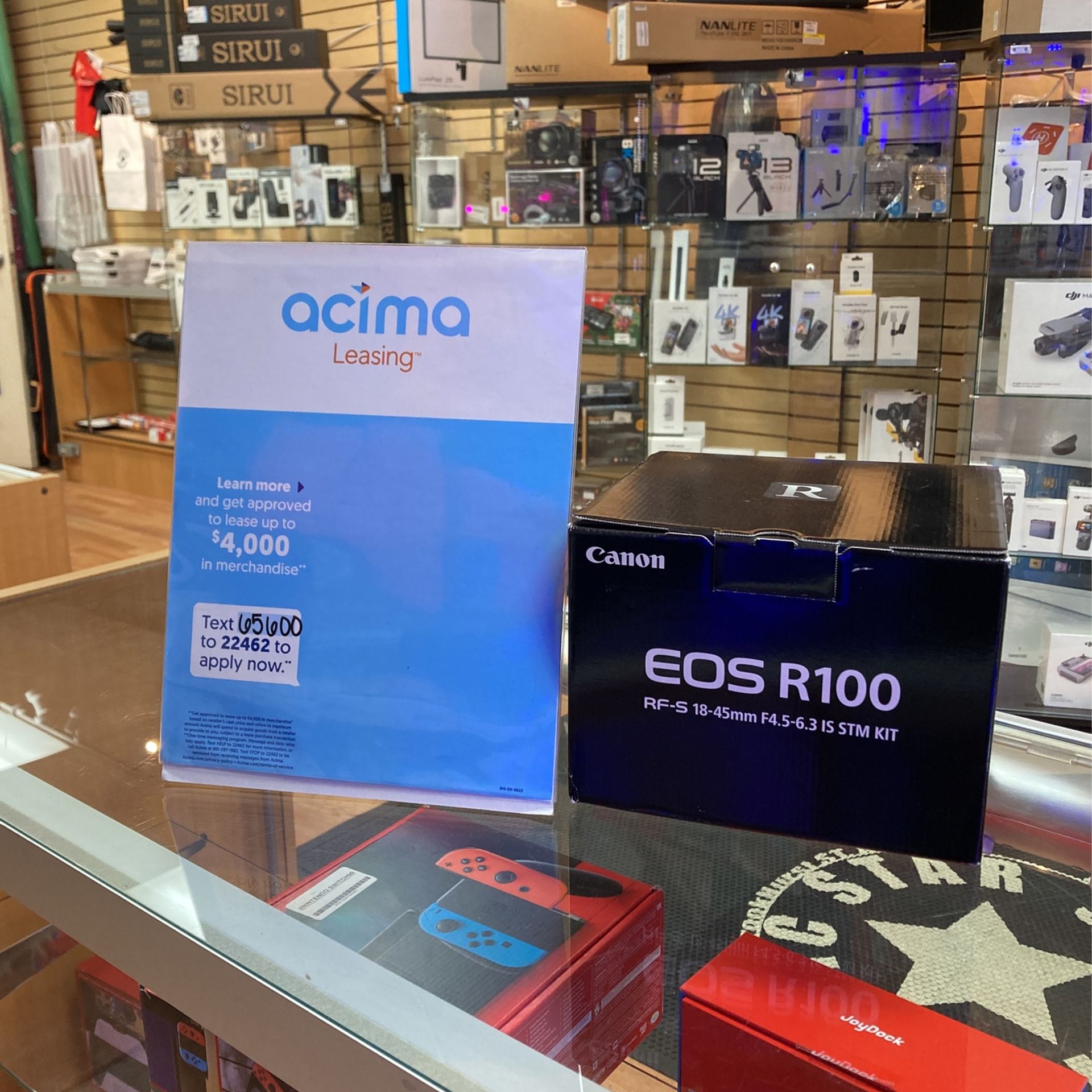 Canon EOS R100 with RF 18-45mm F4 Kit