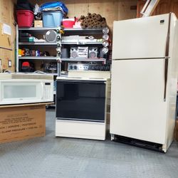 Kitchen Appliance Set Refrigerator Stove And Microwave 