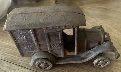 Antique cast iron delivery truck. Metal art, industrial, Christmas,