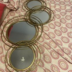 4 swirl mirror, barely used , gold tone