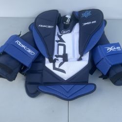 RBK Goalie Chest And Arm Protector AB XPLUSE 6.0 JR-medium. Preowned in good condition with normal signs of usage. 