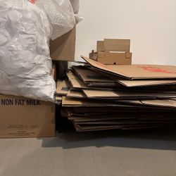 Moving Boxes - Medium, Large And Small With Paper