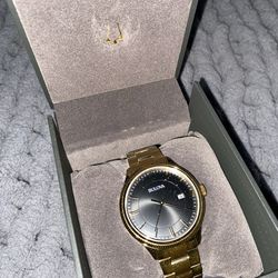 Pick up today Bulova Gold Tone Men's Watch with Black Dial