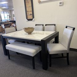 Dining table with 4 chairs and bench
