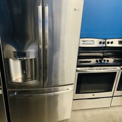 Ge Stainless Steel French Door Fridge And Matching Stove 