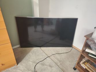 Large Flat Screen TV with Silver Bezel