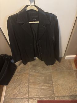 Black leather jacket, size medium