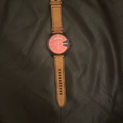 Diesel MS9 Chrono watch with a black ion-plated stainless steel case and a brown leather strap. 