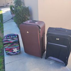 3 Suit cases