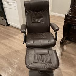 Faux Leather Swivel Armchair And Ottoman 