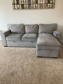 Sectional couch/ sofa with bed and storage
