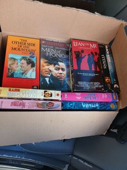 Free 2 boxes of VHS/ movies
