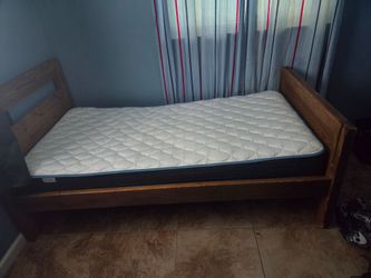 Twin wood bed frame with .mattress