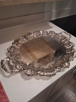 Vintage Sheridan silverplated tray features a shell and gadroon edge design.