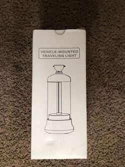 Vehicle mounted traveling light