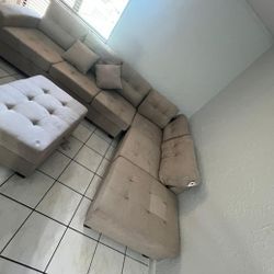 I'm selling a sofa with an ottoman. Ask for the price. 