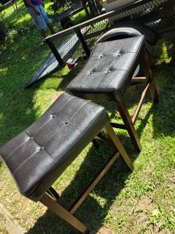 backless counter-height saddle bar stools.