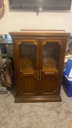 Two curio cabinets