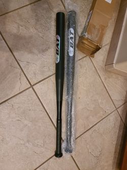 Metal base ball bat, junior, $20 new