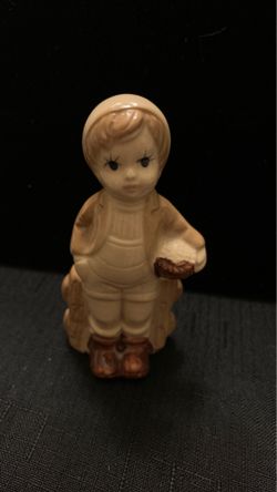 Ceramic boy figure