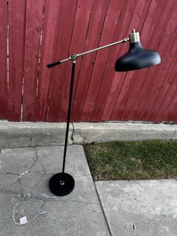 Adjustable Floor Lamp with Balance Arm, Adjustable Head and Height - $30