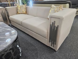 Brand new cream leather air sofa with chrome accents