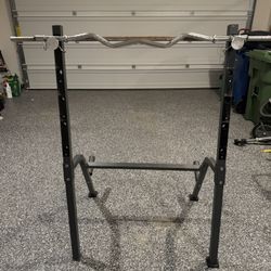 Squat/Weight Rack With Straight Bar, Curling Bar & (2) 25lb Weights