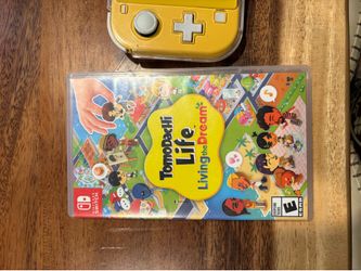 yellow switch lite + tomodachi life living the dream
