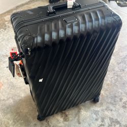 Tumi Aluminum Suitcase