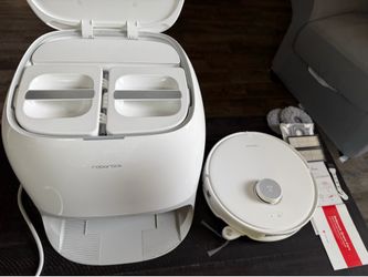 Great deal Sells new for 850.00 Roborock Qrevo Curvy Robotic Vacuum & Mop with Self-Emptying Station