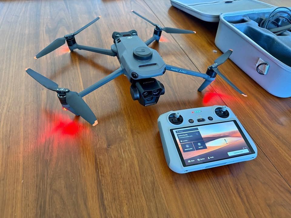 Mavic 3 Pro + DJI RC - Includes with drone, controller, battery, charger, and carry-case