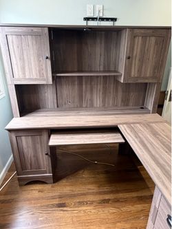 Three piece office furniture set: desk and bookshelves