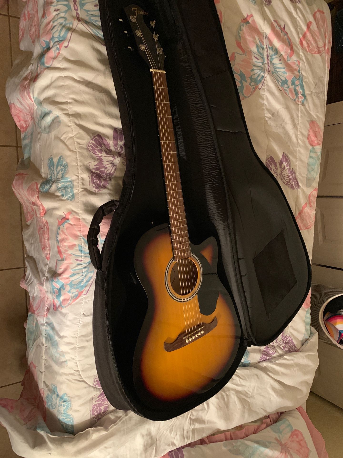 Fender guitar. Comes with a pick ,extra battery for tuner,case