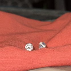 Two Diffent Sized Diamon Earings 