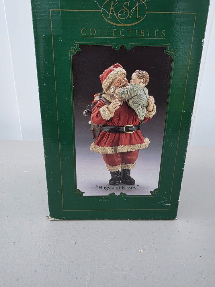 Santa hugs and kisses
Fabriche KsA Collectibles