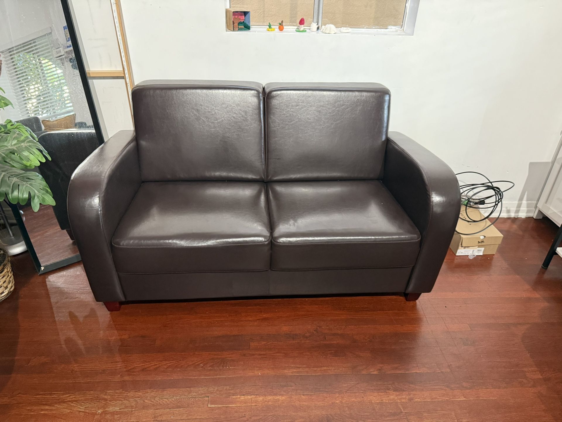 Compact Brown Leather Couch