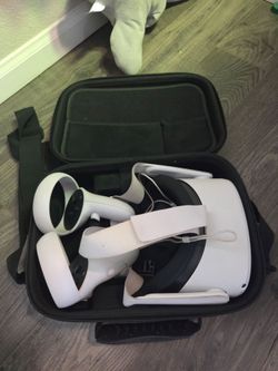 Oculus Quest 2 VR headset with controllers and Carrying Case