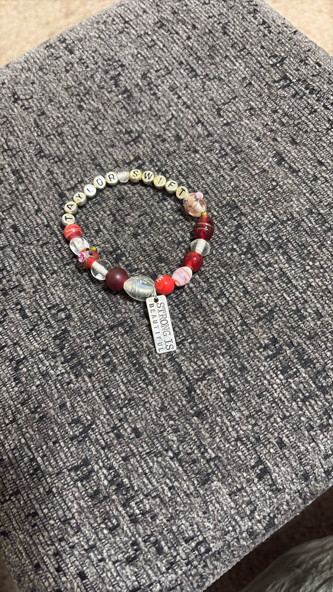 Taylor Swift Bracelet With Charm Reads- Strong Is Beautiful!