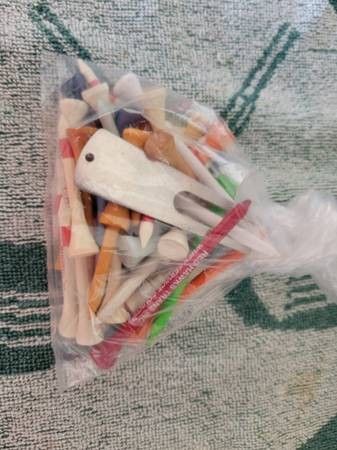 Golf tees various types and sizes, divot tool and ball markers