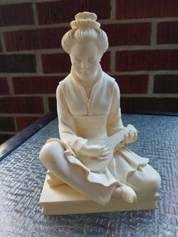 Asian girl sculpture signed by artist Grannelli