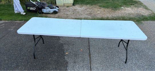 8ft folding table. Folds in half