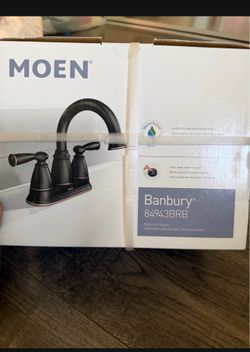 MOEN-BATHROOM FAUCET BRONZE. BRAND NEW