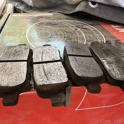 Used brake pads & rotors from a 2003 Nissan 350Z.