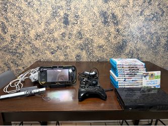 Wii U with games