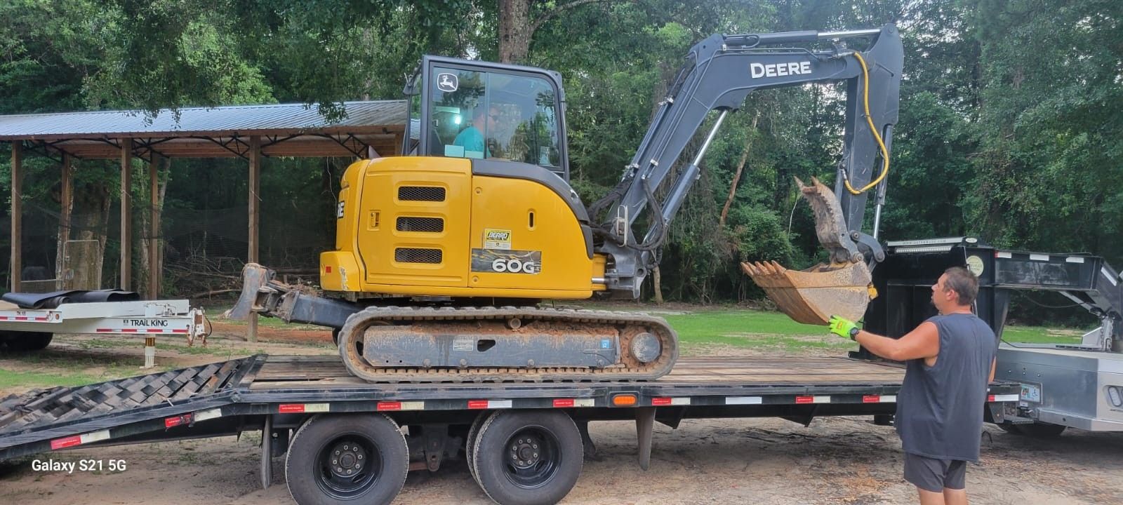 Excavator with Operator