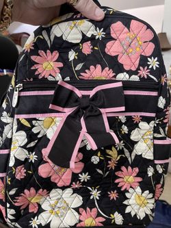 Pink and black backpack